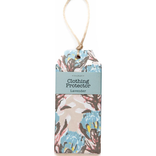 A hanging fabric clothing protector tag with a natural jute loop, featuring a floral pattern in shades of blue, pink, and beige, with a light blue label that reads 'Triple U Clothing Protector Lavender'.
