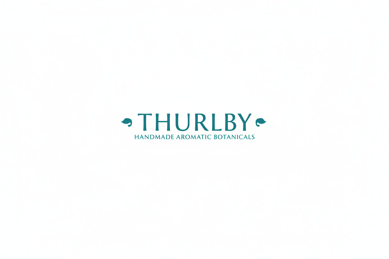 Thurlby logo with teal text and decorative elements on a white background